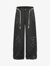 Stylish Wide-Leg Trousers with Artistic Embroidery and Adjustable Drawstrings 