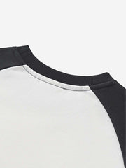 Distressed Graphic Color Block Cropped Sweatshirt