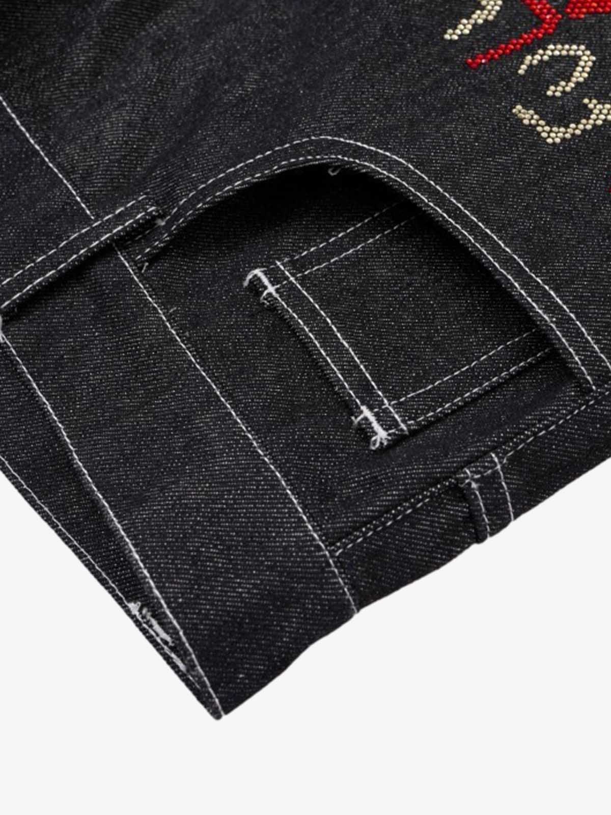 Denim Graffiti Wide Leg Pants with Embroidered Art Design and Bold Statement Text 