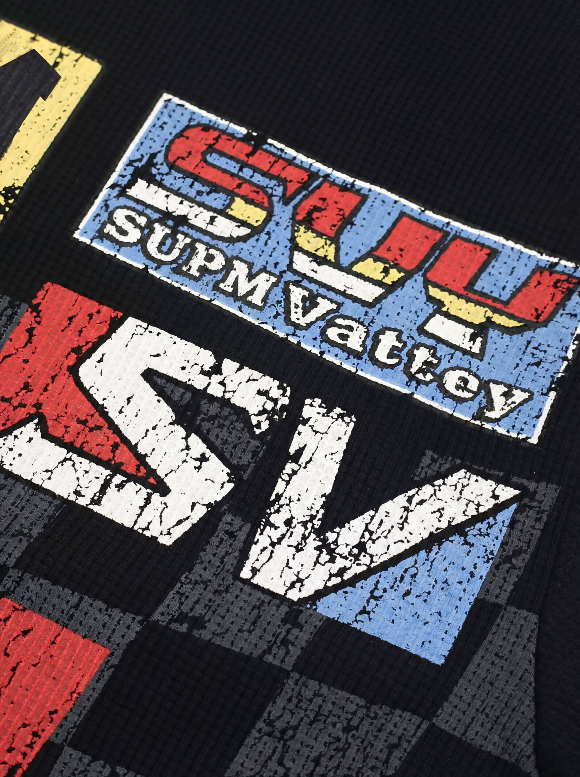 Cotton Oversized Graphic T-Shirt with Newspaper Print and Metal Eyelets 