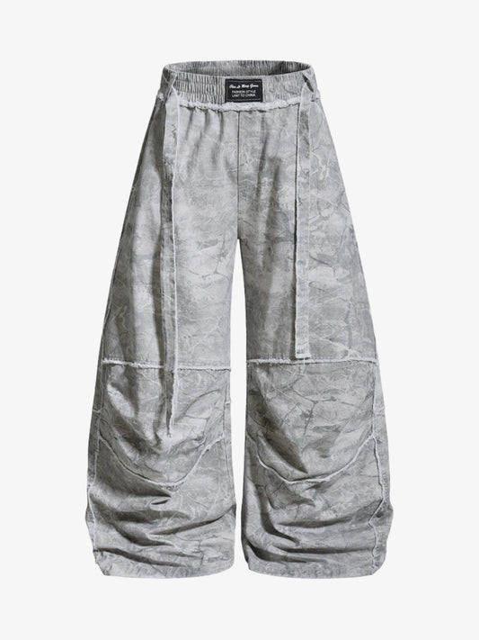 Pantalones de pierna ancha con cordón y estampado tie-dye