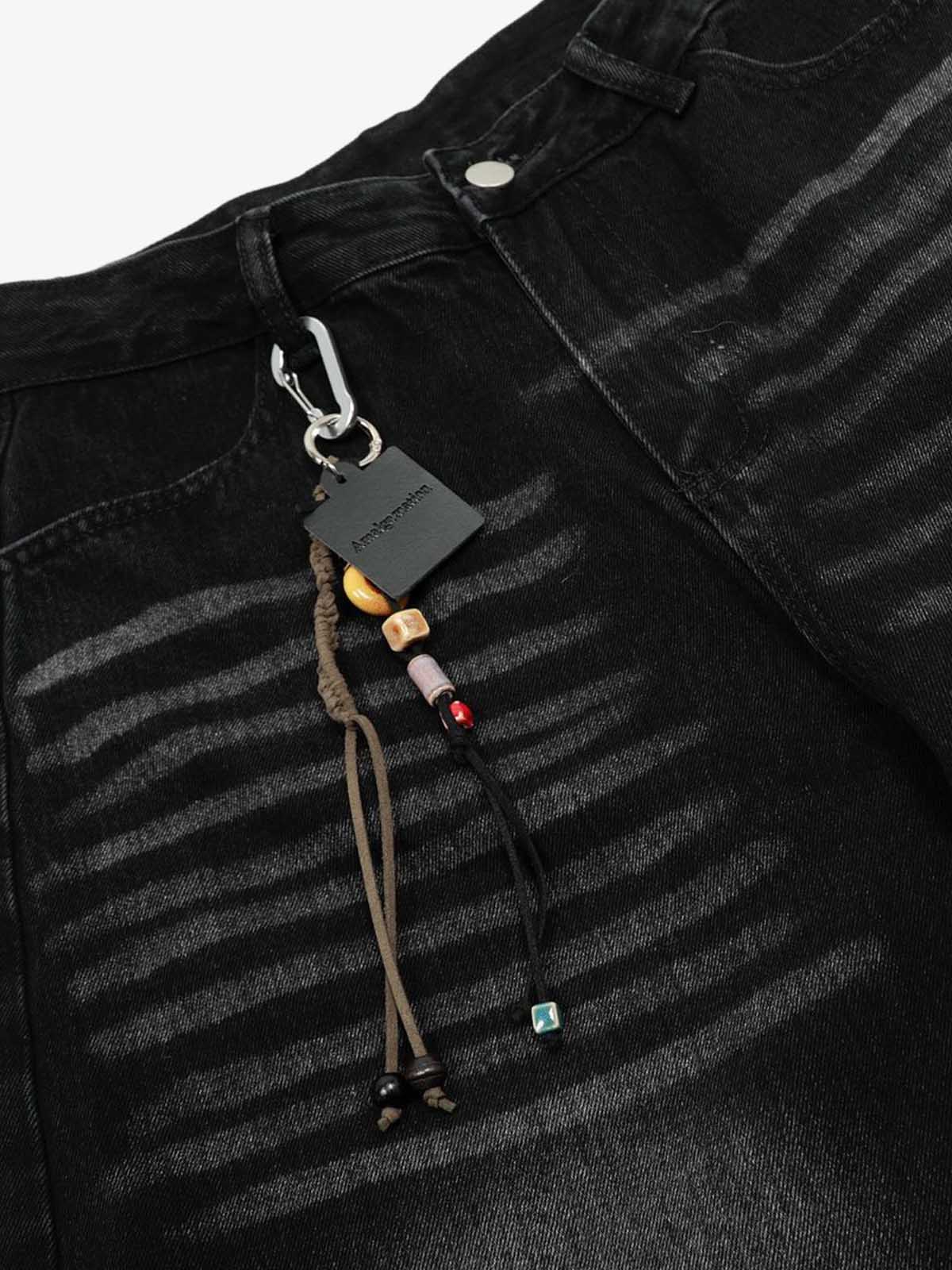 Distressed Black Denim Jeans with Embroidered Design and Cross Patch 