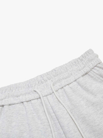 Pantalon de survêtement à jambes larges avec typographie multicolore