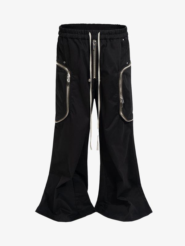 Black nylon wide-leg cargo pants with long drawstrings and zippered pockets