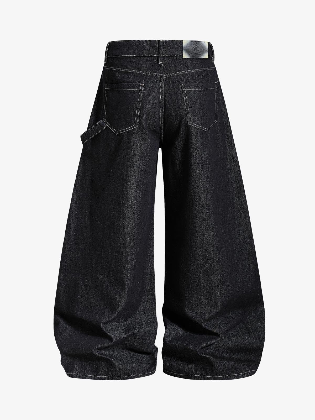 Jeans holgados de mezclilla cruda con grafiti de Thesupermade