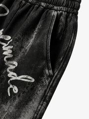 Pantalon de survêtement délavé à jambes larges, avec imprimé graphique scorpion et effet pulvérisé