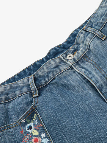 Short en jean délavé à fleurs