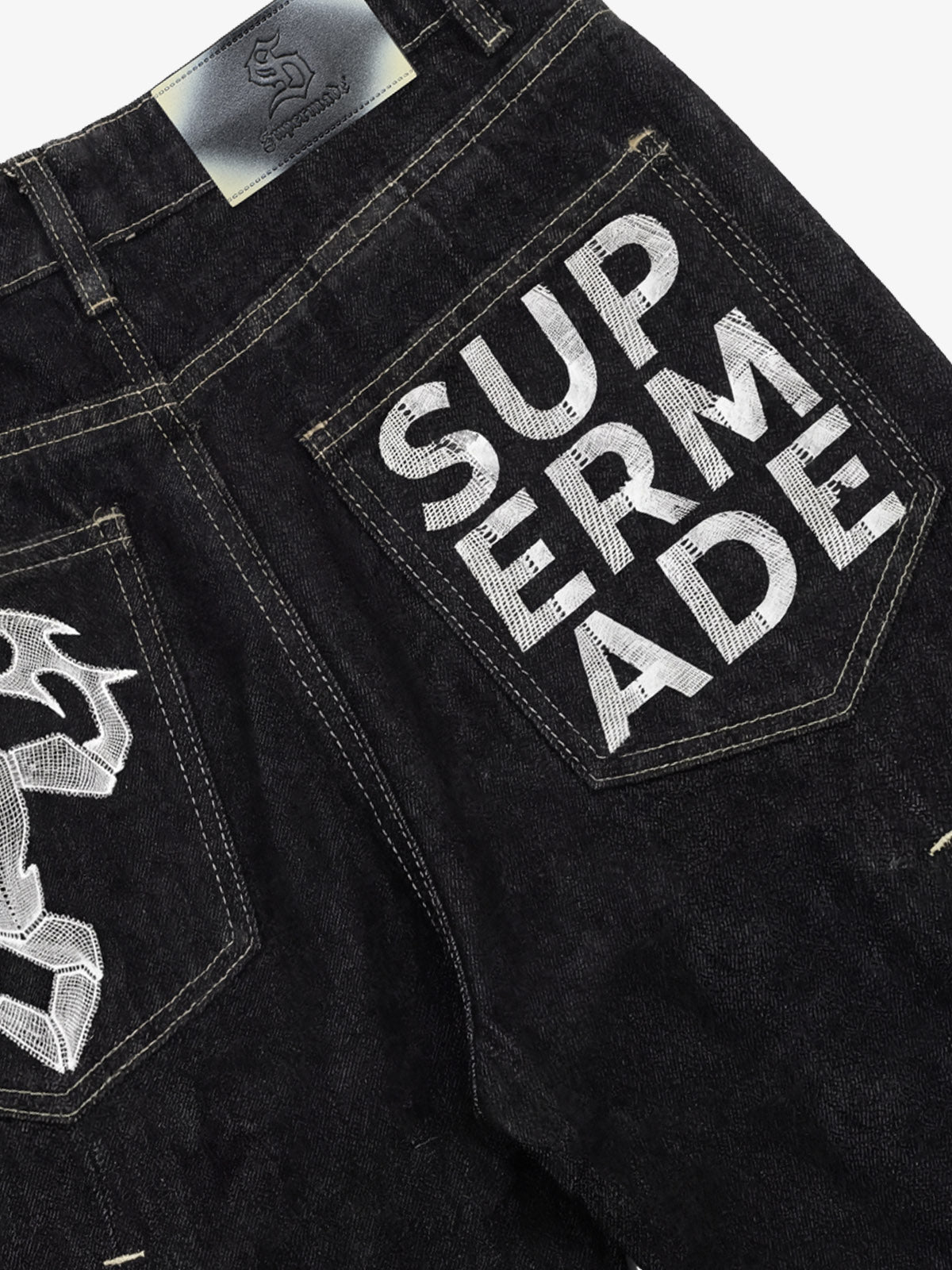 The Supermade Cotton Blend Washed Pleated Wide-leg Jeans With A Scorpion Logo Faux Embroidered Print Design. 