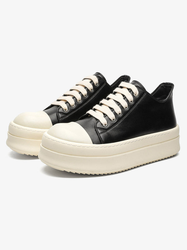 Chunky dark low-top sneakers