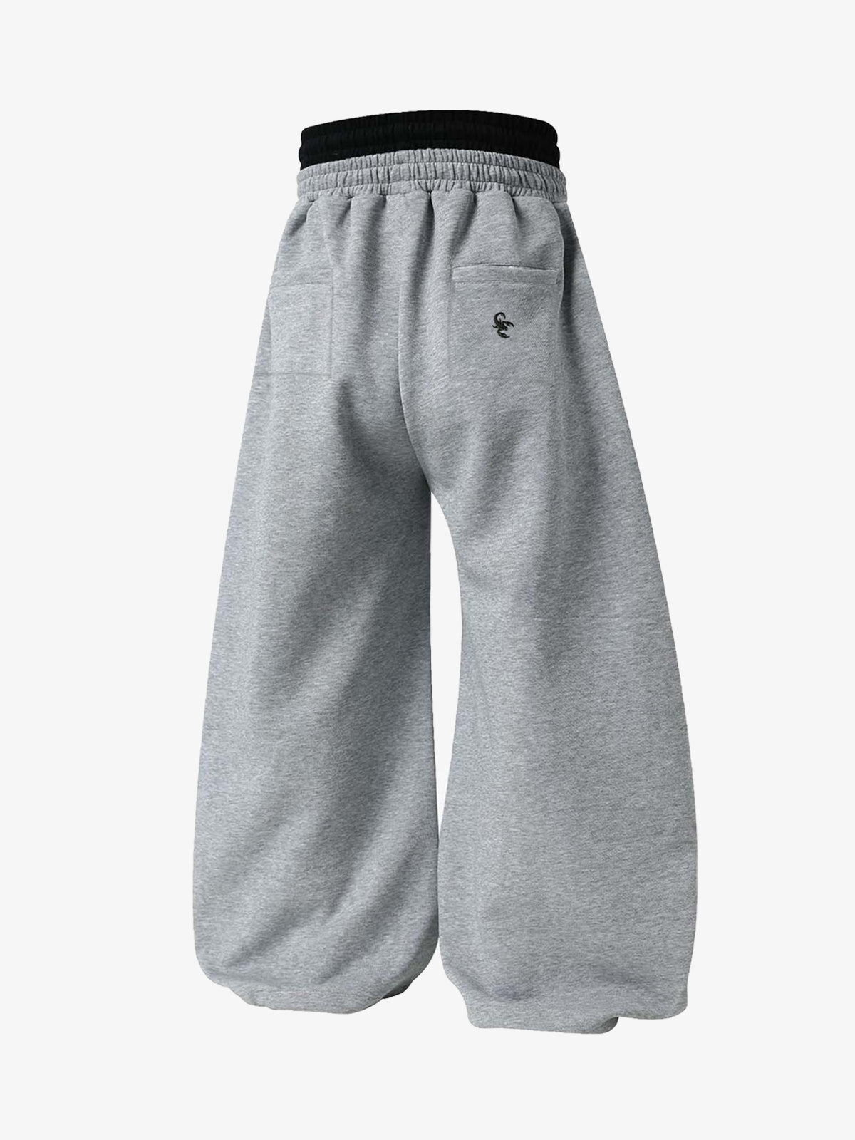 Pantalones deportivos fruncidos de doble talle