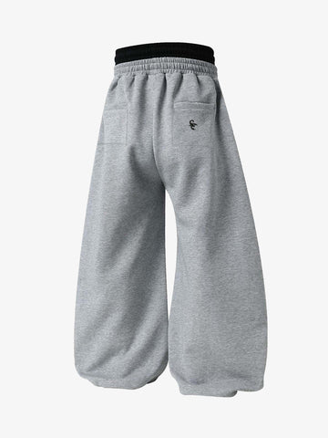 Pantalones deportivos fruncidos de doble talle
