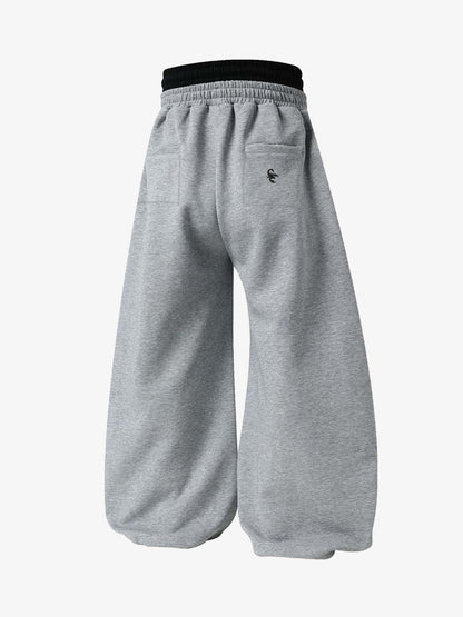 Pantalones deportivos fruncidos de doble talle