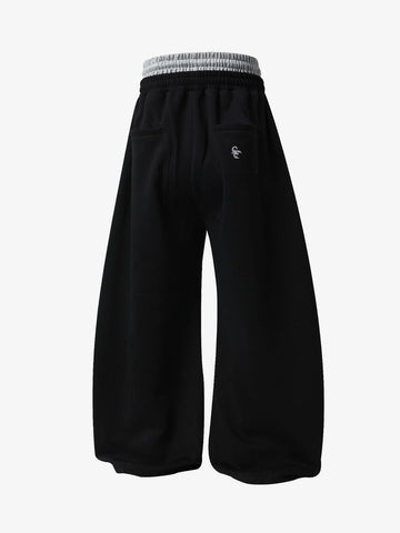 Pantalones deportivos fruncidos de doble talle