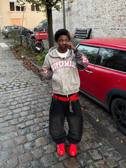 Veste courte en daim à grandes poches et fermeture éclair en deux parties