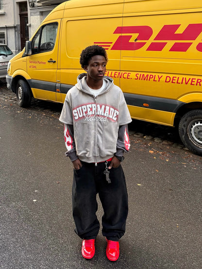 Veste courte en daim à grandes poches et fermeture éclair en deux parties