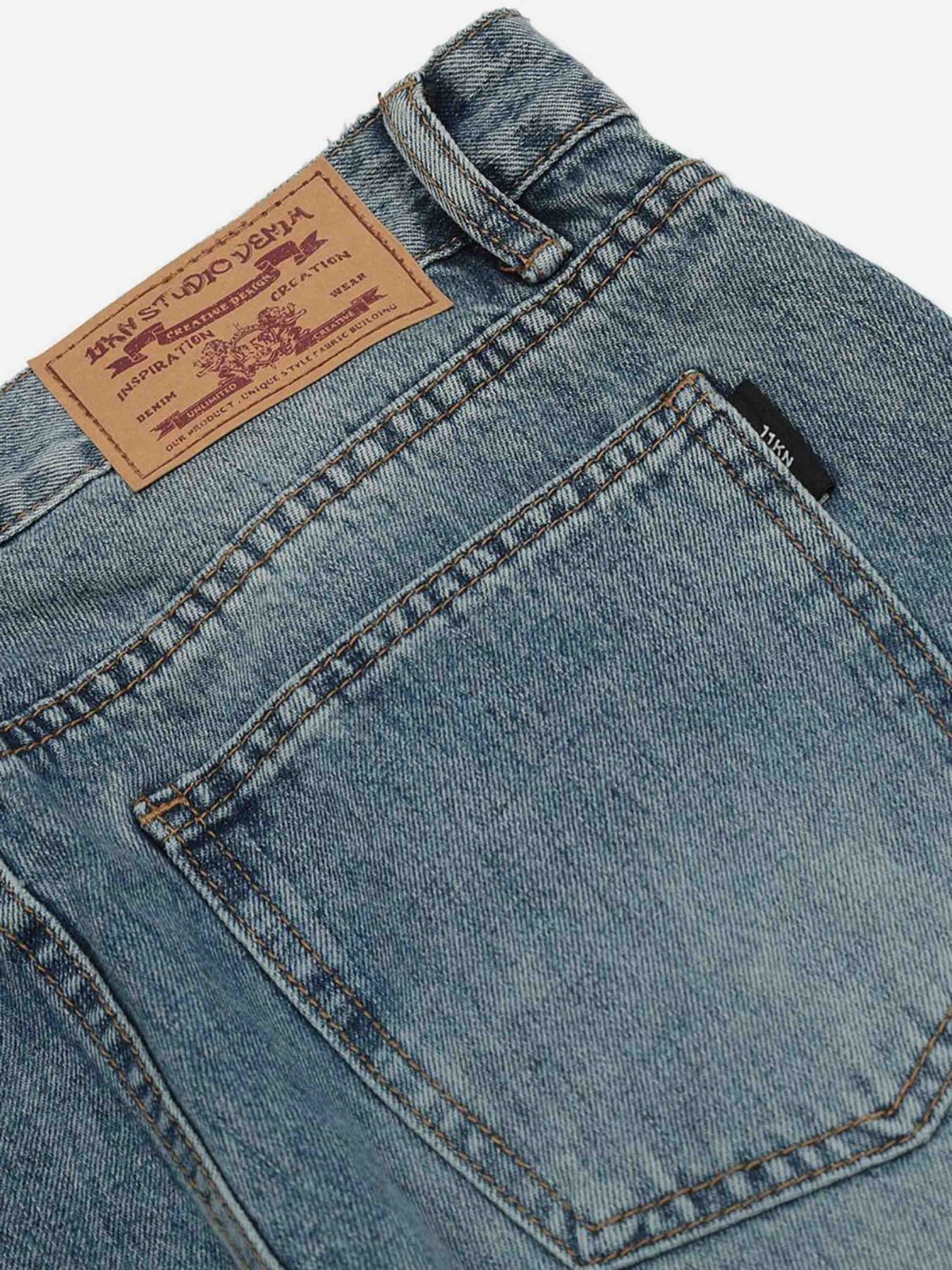 The Supermade Washed Graffiti Ripped Jeans